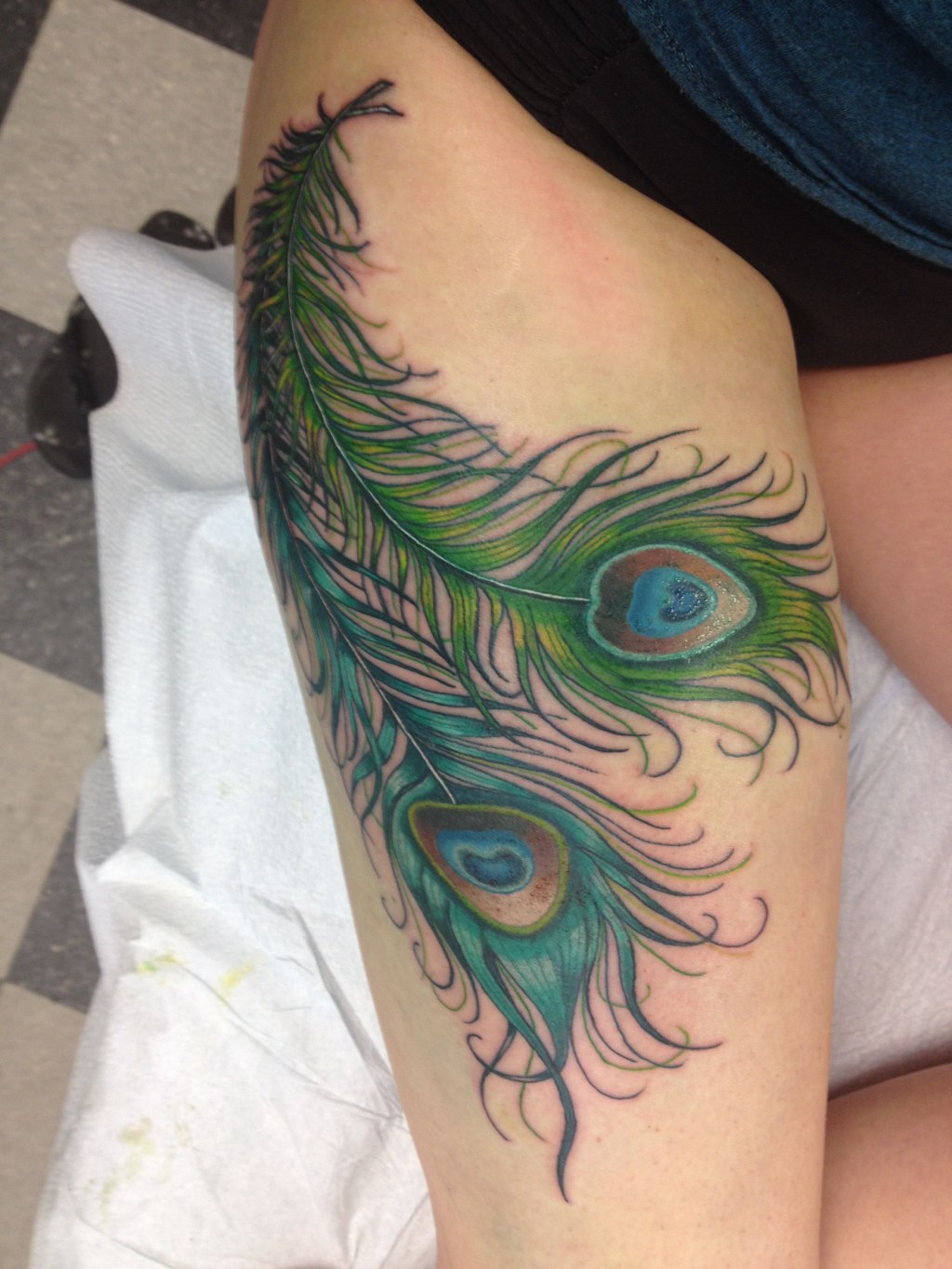 Picture of: New thigh piece – love!!  Peacock feather tattoo, Feather tattoo